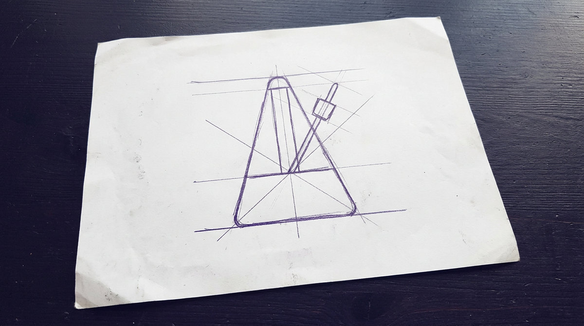 a mechanical metronome with a triangular body and an inverted pendulum rod with an adjustable sliding weight