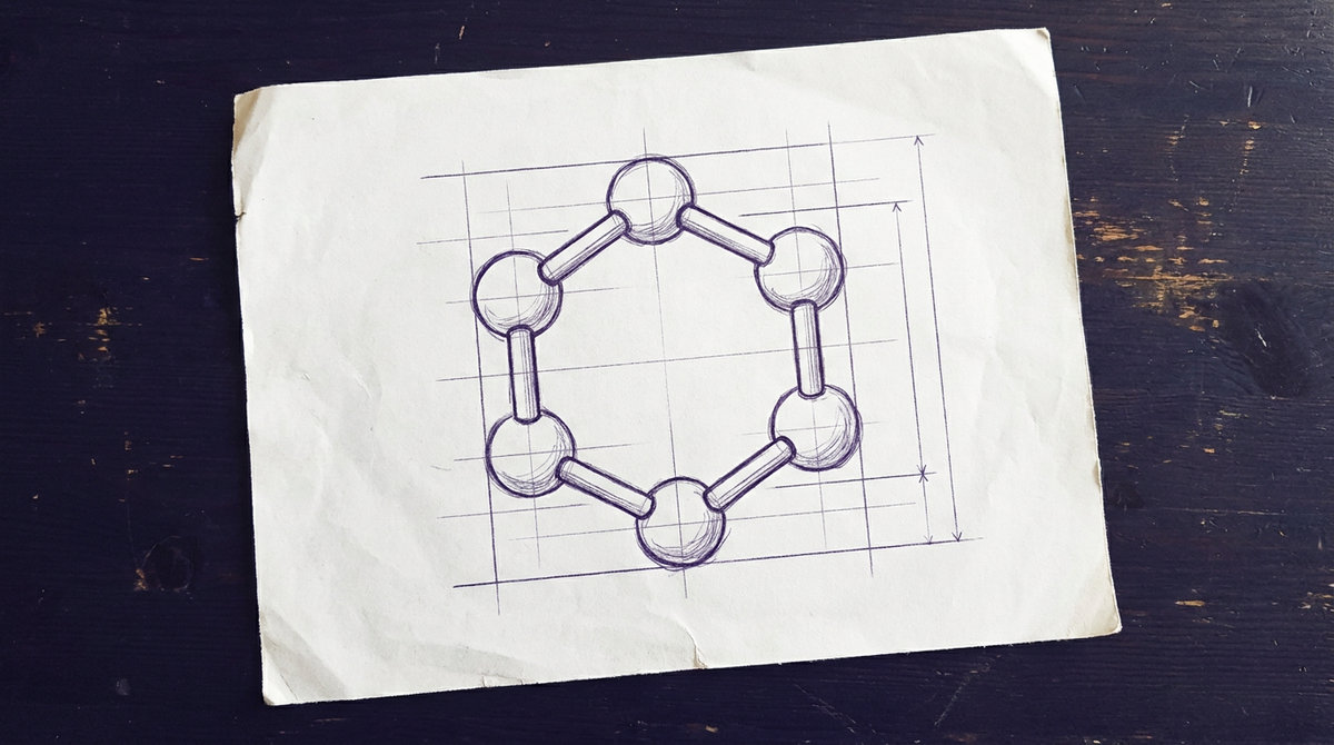 a ball and stick molecular model depicting a hexagonal benzene ring composed of six spherical atoms joined in a closed ring by cylindrical rods